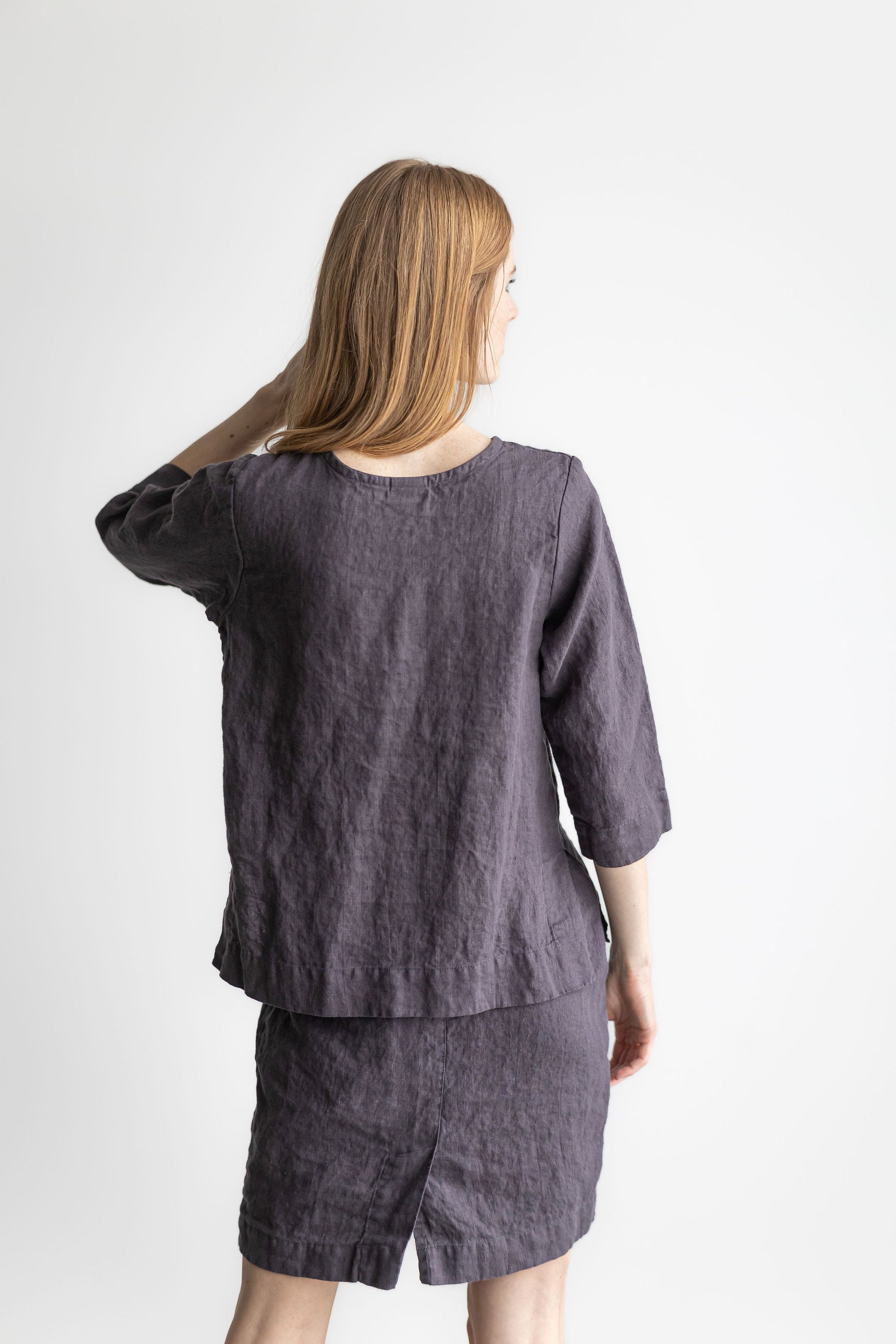 Classic linen blouse in a dark aubergine color.