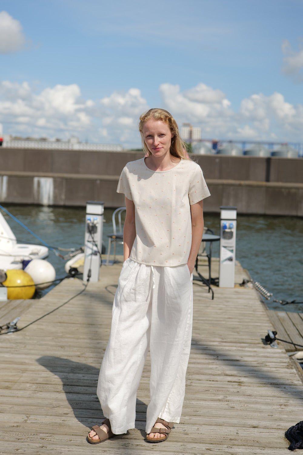 Short Sleeve Summer Polka Dot Top Bachata worn together with white loose trousers