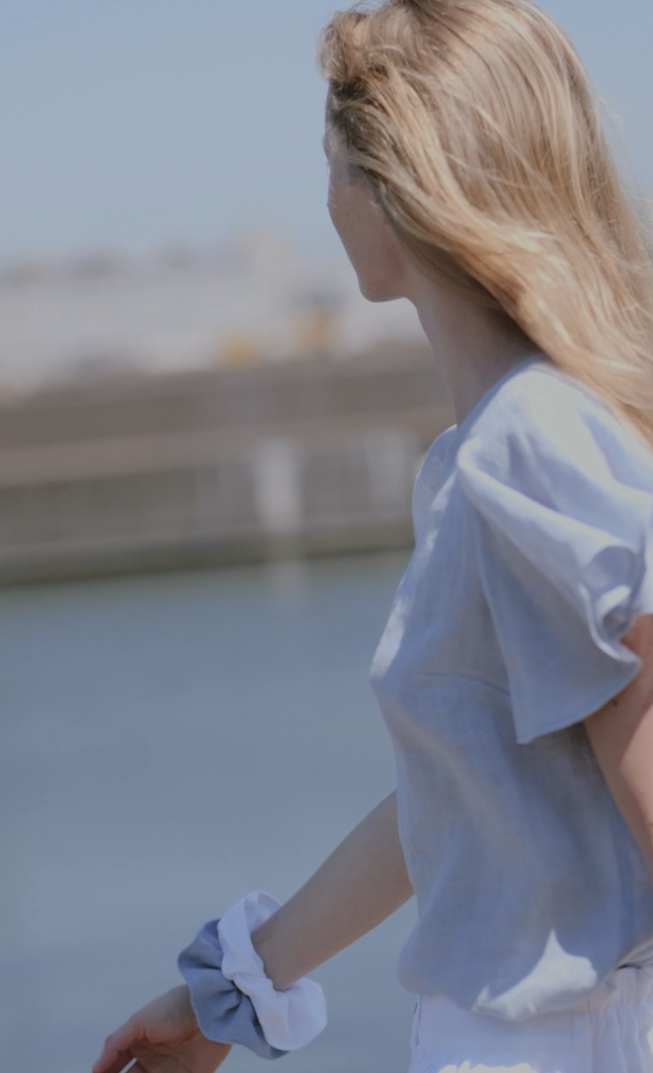 Relaxed-fit gauze linen shirt with feminine ruffle sleeves for effortless summer dressing