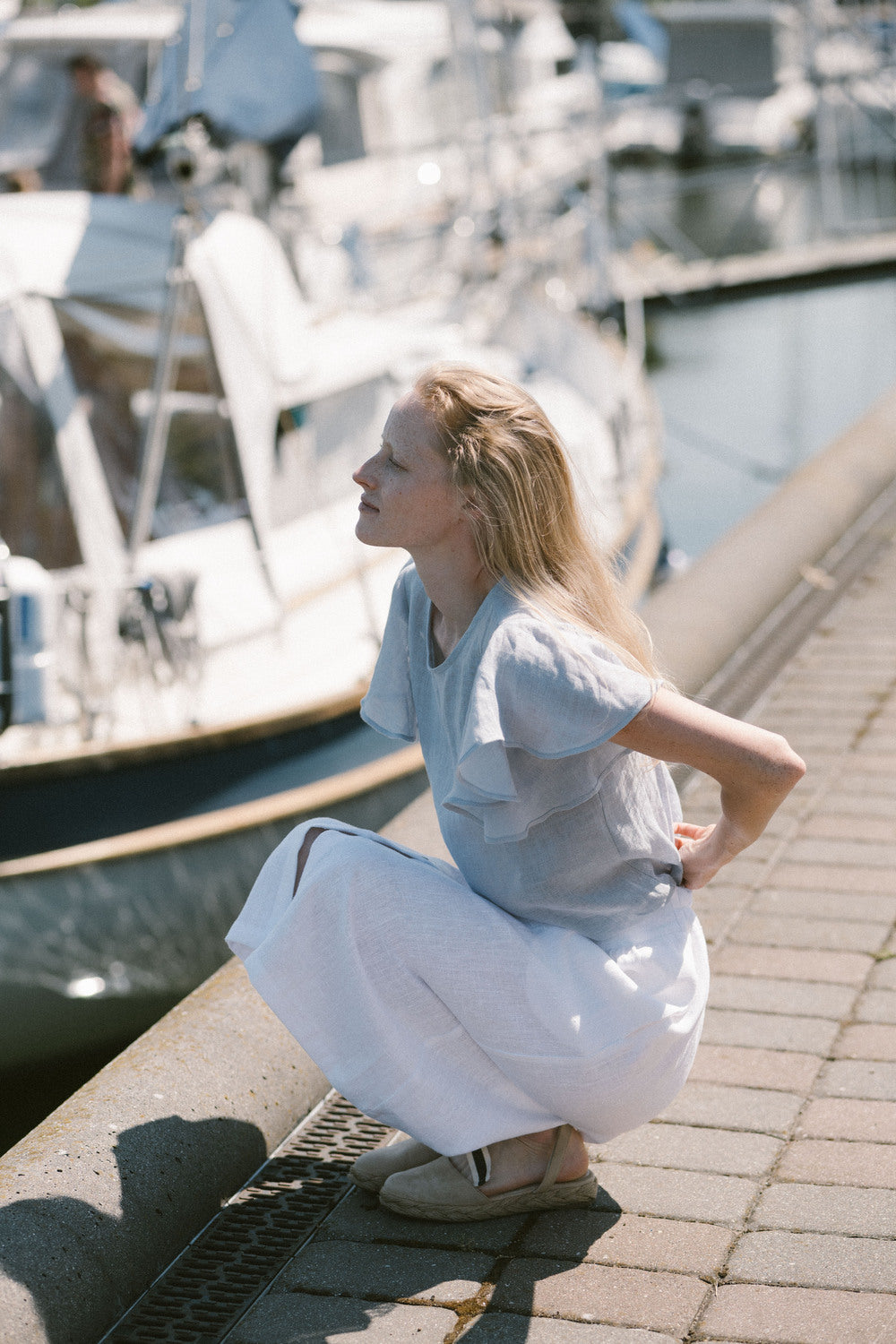 Casual linen top in  light blue, ideal for beach or yacht outings