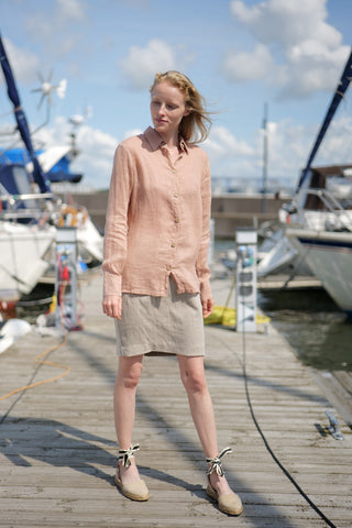 Light gauze linen summer shirt worn together with heavy linen skirt